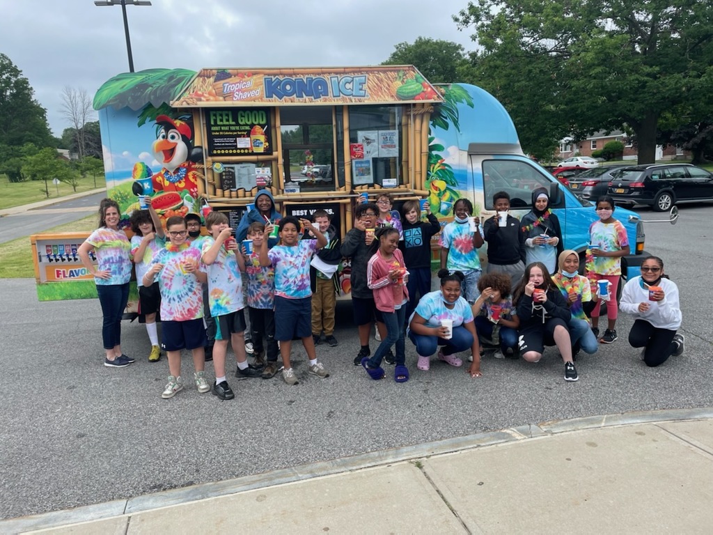 5th Graders enjoying the ice truck as part of moving up celebration