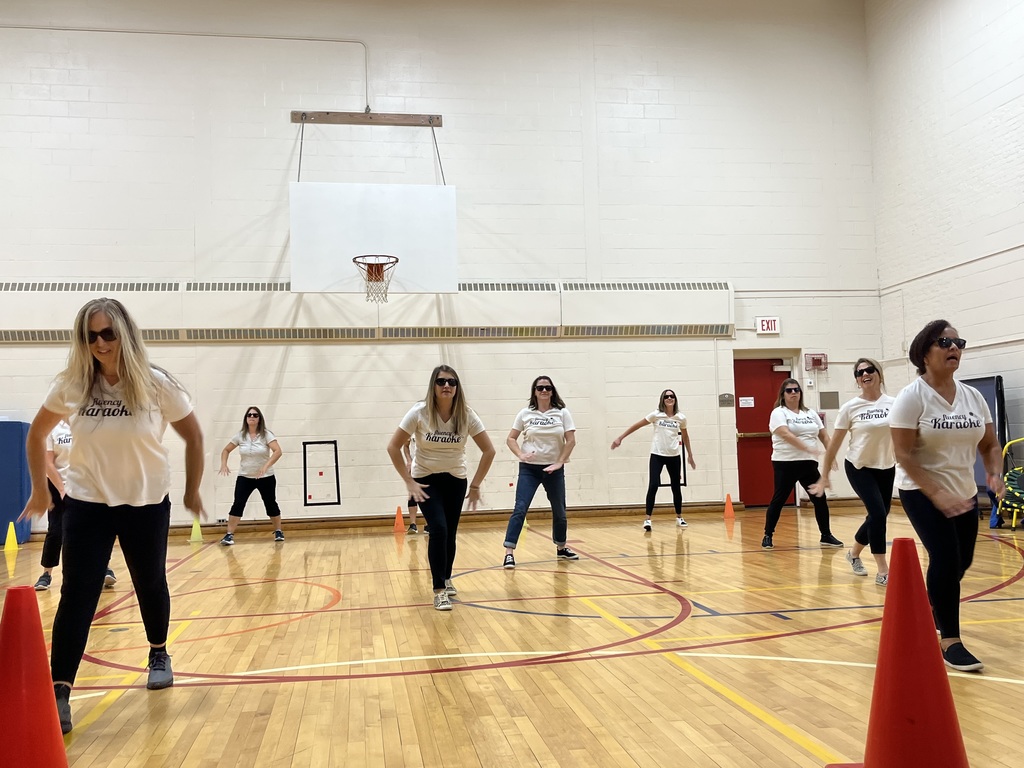 teachers perform dance routine