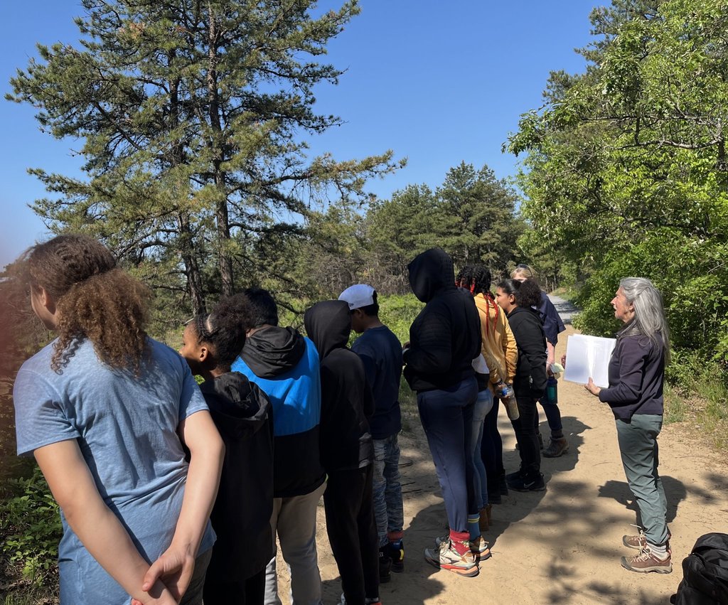 Students on field trip hiking at Albany Pine Bush